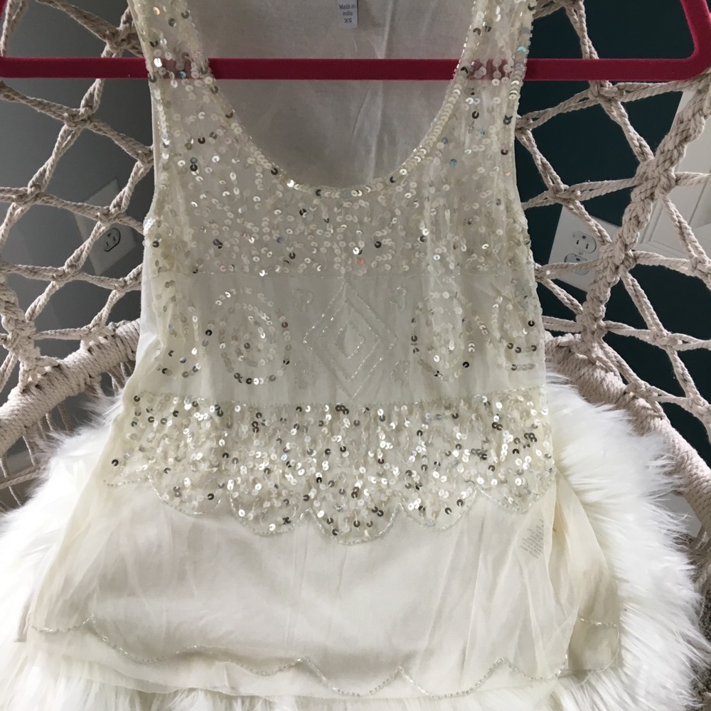 Sheer cream sparkly top